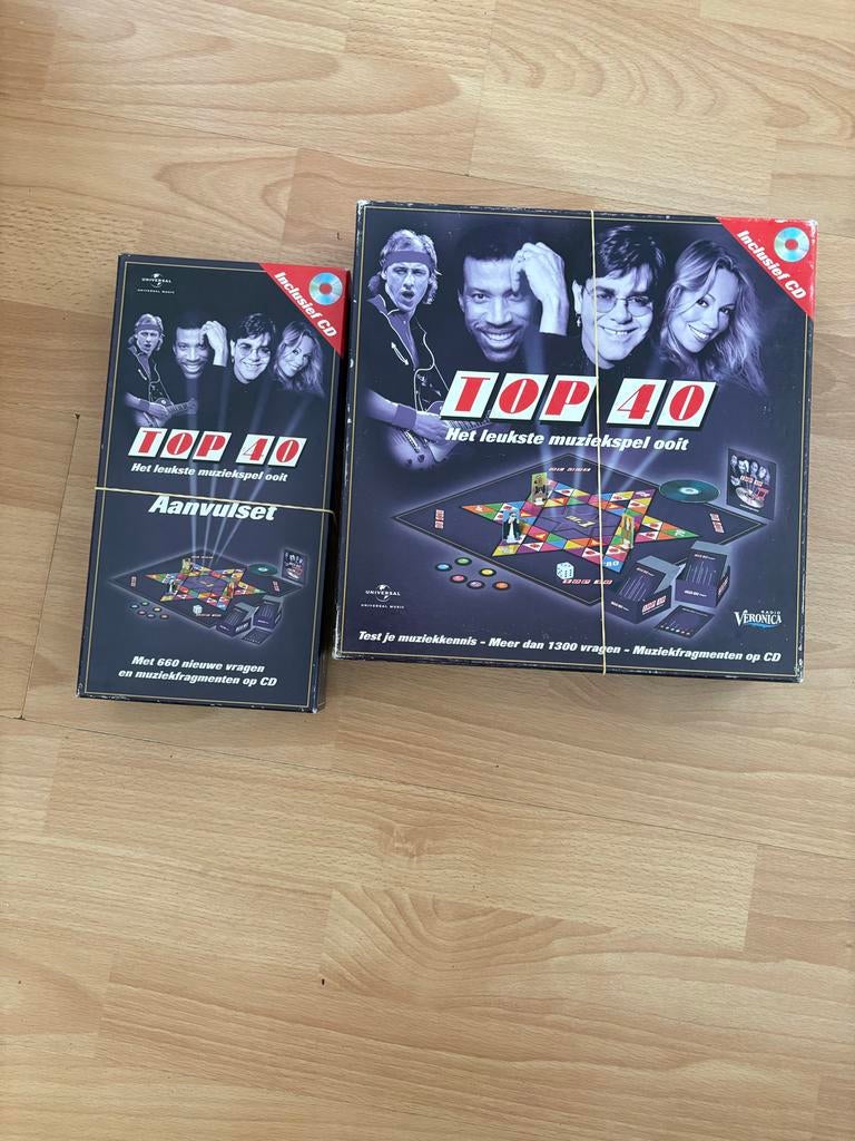 Top 40 Het leukste muziekspel ooit + Aanvulset, Hobby en Vrije tijd, Gezelschapsspellen | Bordspellen, Drie of vier spelers, Ophalen of Verzenden