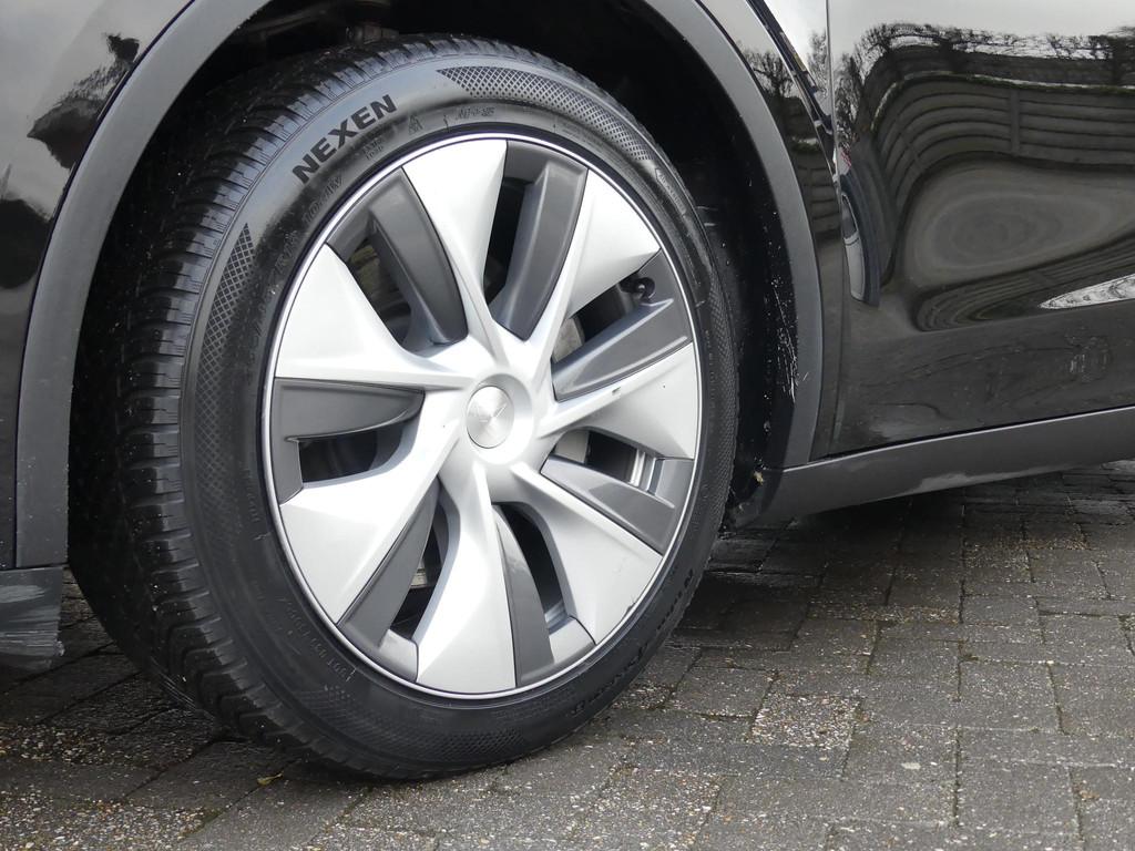 Tesla Model Y Long Range AWD 75 kWh *t/m 10de bouwjaar garan, Stof, Gebruikt, Met garantie (alle), Zwart