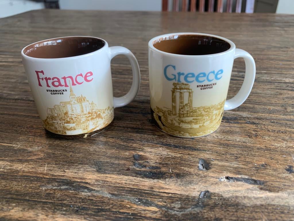 2x Starbucks kopjes France en Greece, Nieuw, Ophalen of Verzenden, Overige stijlen, Kop(pen) en/of Schotel(s)