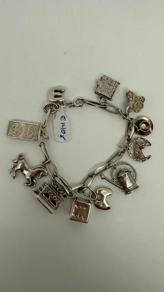 Zwaar zilveren bedelarmband met eraan: 11 bedels., Verzenden, Zo goed als nieuw, Zilver