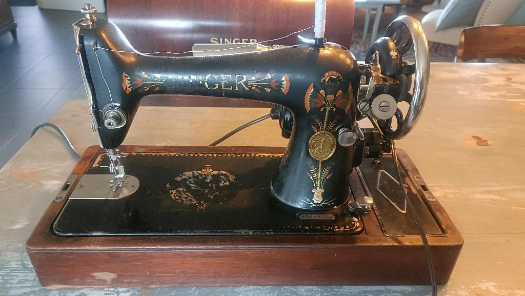 Singer 66K antieke naaimachine (met Lotusbloem), Ophalen