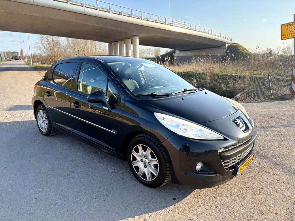 Peugeot 207 1.4 VTI Sportium 16V 5DRS 2011 Zwart, Auto's, Peugeot, Voorwielaandrijving, Stof, Zwart, 1064 kg