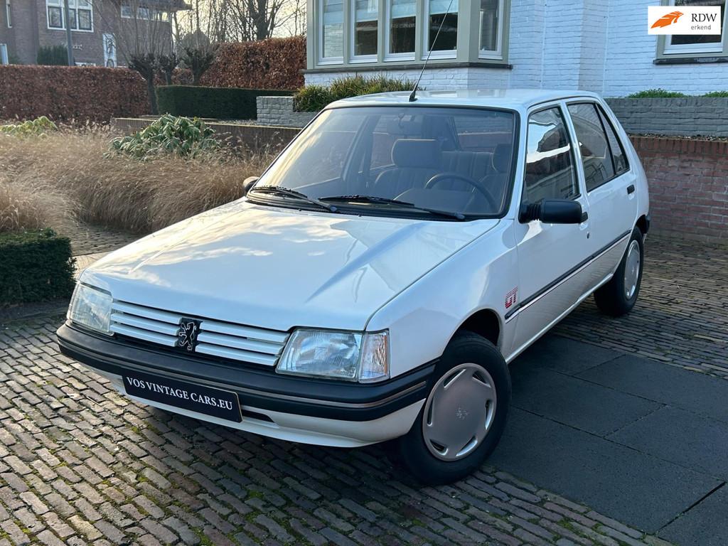 Peugeot 205 1.6 GT, Auto's, Peugeot, Gebruikt, Wit, Origineel Nederlands, Bedrijf