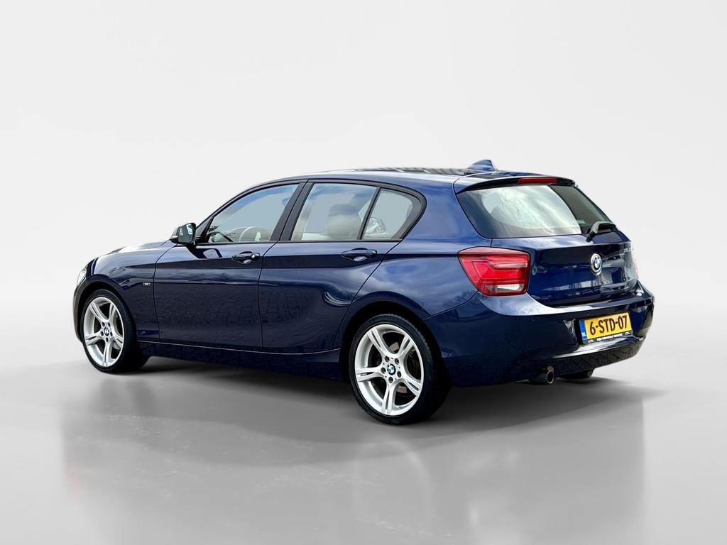 BMW 1-serie 116i High Executive Automaat | NAP | Stoelverwar, Gebruikt, Euro 6, 4 cilinders, Blauw
