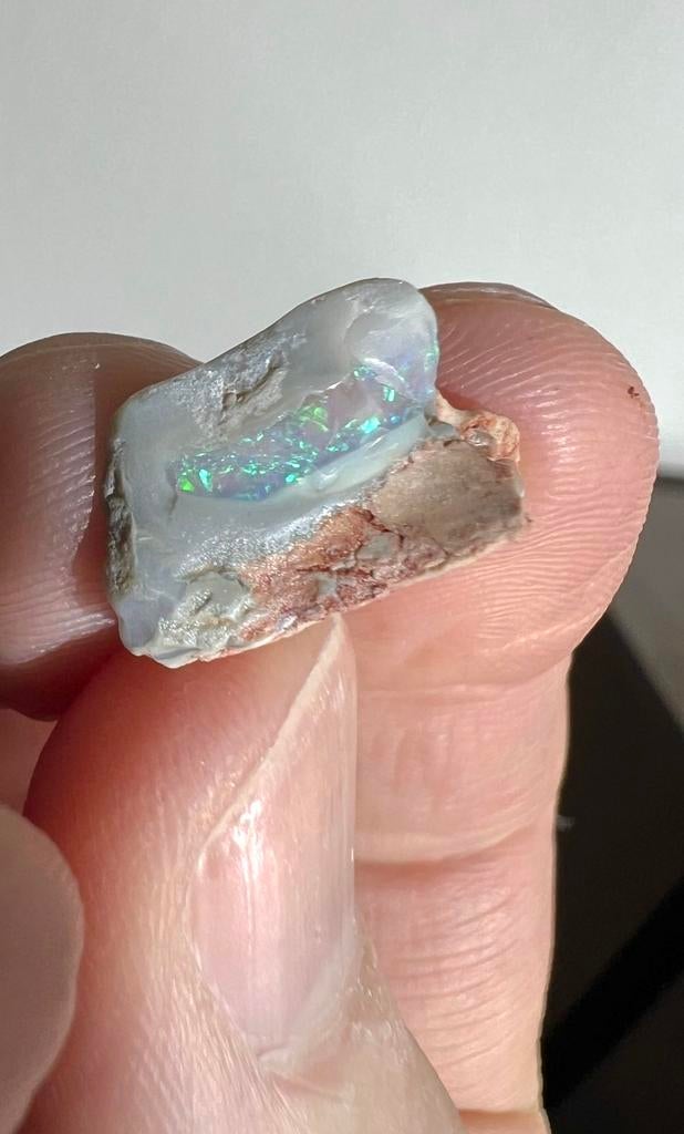 Stukje Australisch opaal, Ophalen