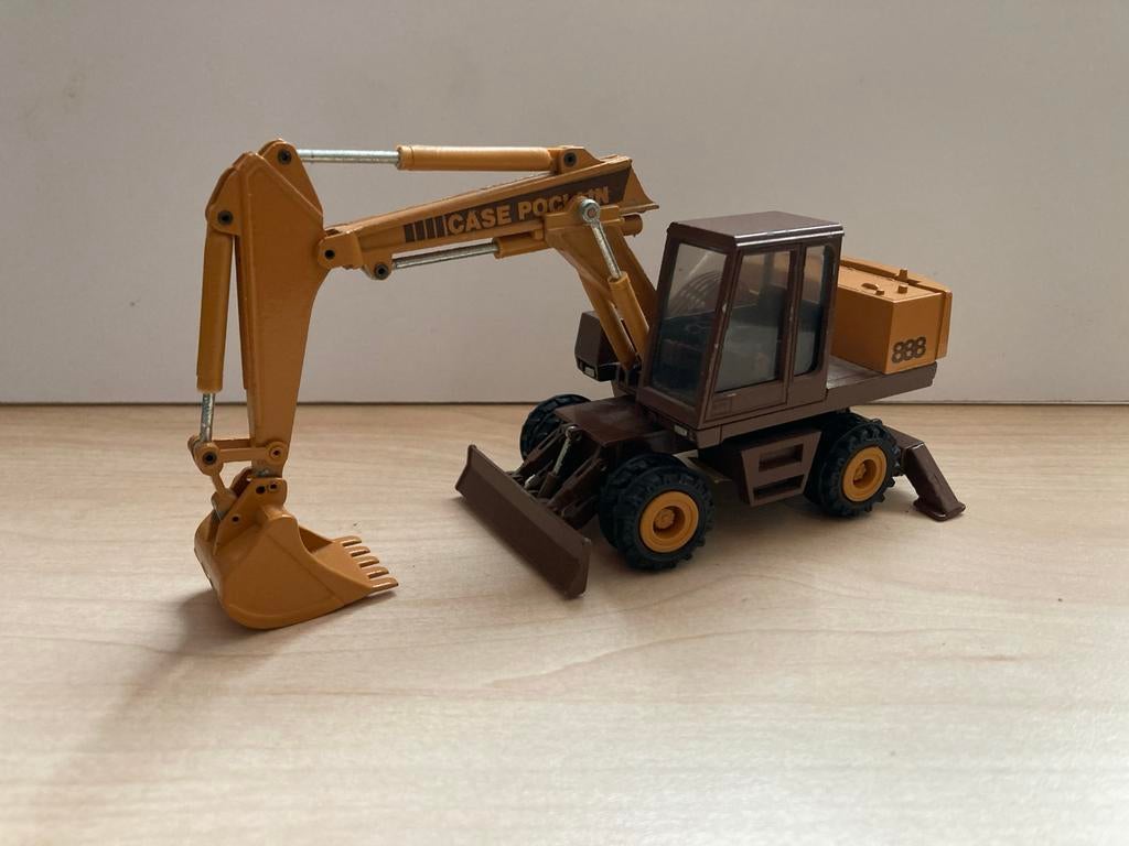 Case Poclain 888 graafmachine, Ophalen of Verzenden, Gebruikt, Bus of Vrachtwagen