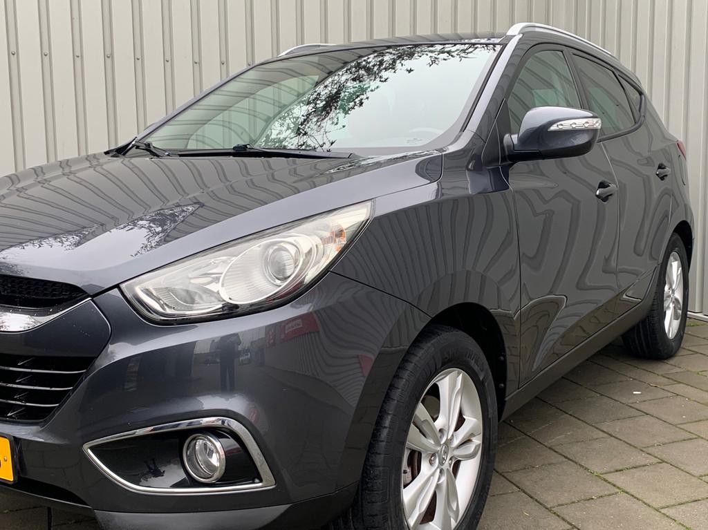 Hyundai Ix35 2.0i Business Edition|Navigatie|149000KM|Climat, Gebruikt, Zwart, 4 cilinders, Leder en Stof