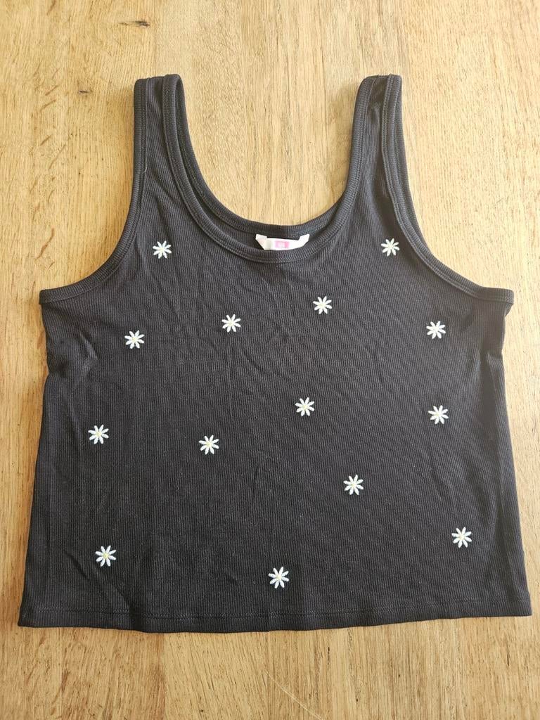 Zwart topje met madeliefjes WE Fashion maat 170-176, Kinderen en Baby's, Kinderkleding | Maat 170, Meisje, Nieuw, Ophalen of Verzenden