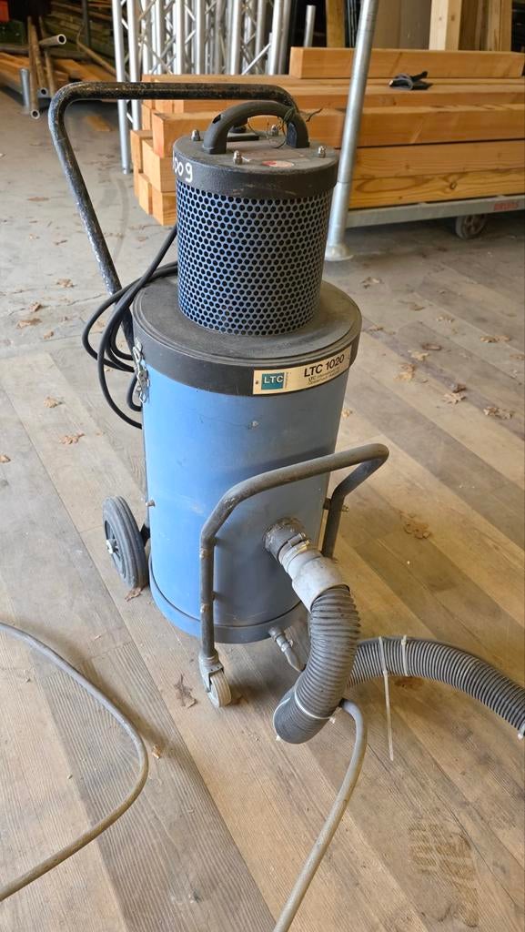 Straalmachine. Zandstraal, Ophalen