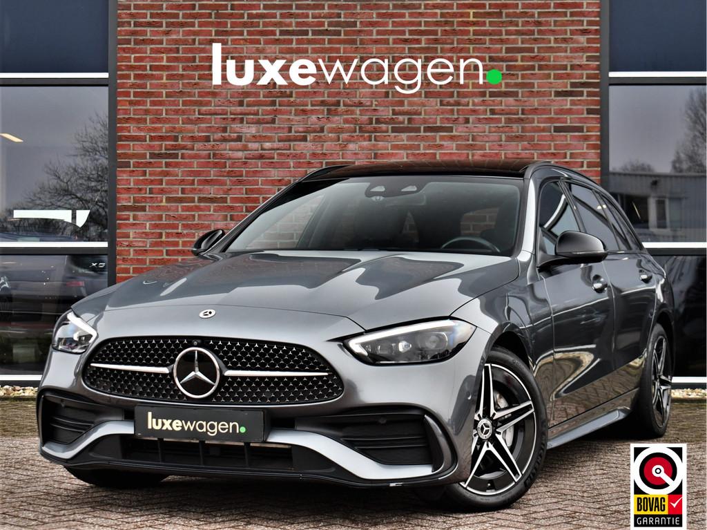 Mercedes-Benz C-Klasse Estate 300 e AMG Line Pano Trekh Dist, Auto's, Automaat, 12 maanden, Achterwielaandrijving, Zwart