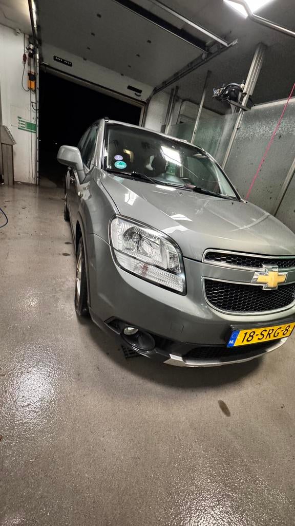 Chevrolet Orlando 1.8 AUTOMATIC 2011 Grijs 7 Person, Auto's, Particulier, Zilver of Grijs, 84 €/maand, 750 kg