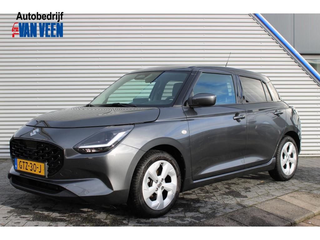 Suzuki Swift 1.2 Select SmartHybrid | All-Season banden | Or, Voorwielaandrijving, Stof, Gebruikt, 894 kg