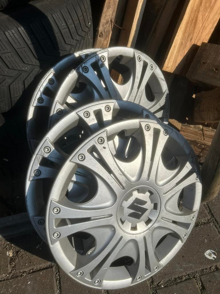 13 inch Wieldoppen Suzuki Origineel, Auto diversen, Ophalen of Verzenden, Zo goed als nieuw