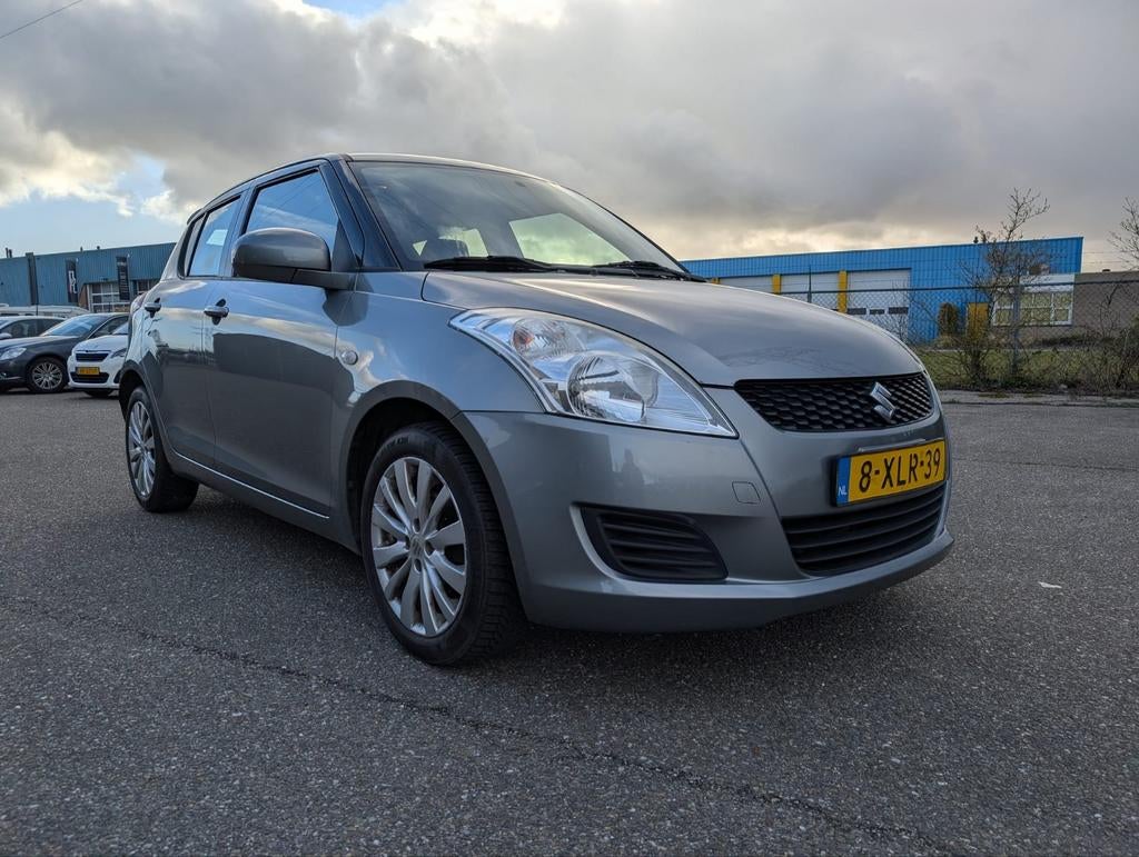 Suzuki Swift 1.2 5-D 2014 Grijs, Voorwielaandrijving, Stof, 4 cilinders, 400 kg