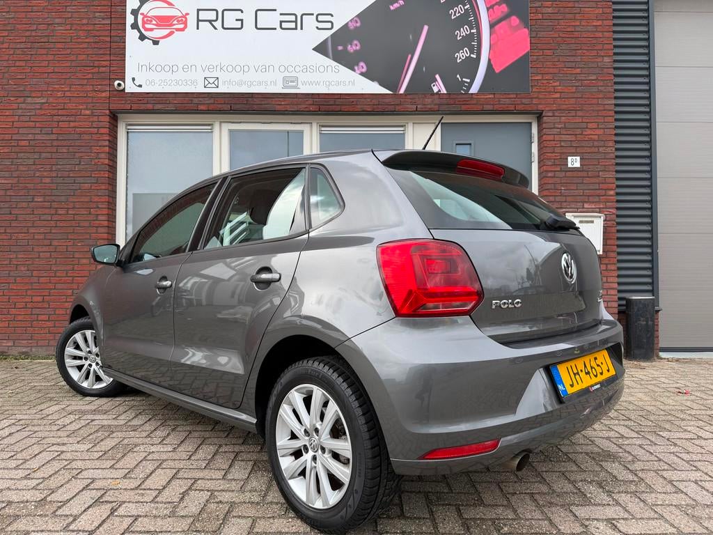 Volkswagen Polo 1.2 TSI Comfortline / Airco / Cruise / LM /, Auto's, Stof, 4 cilinders, Met garantie (alle), Handgeschakeld