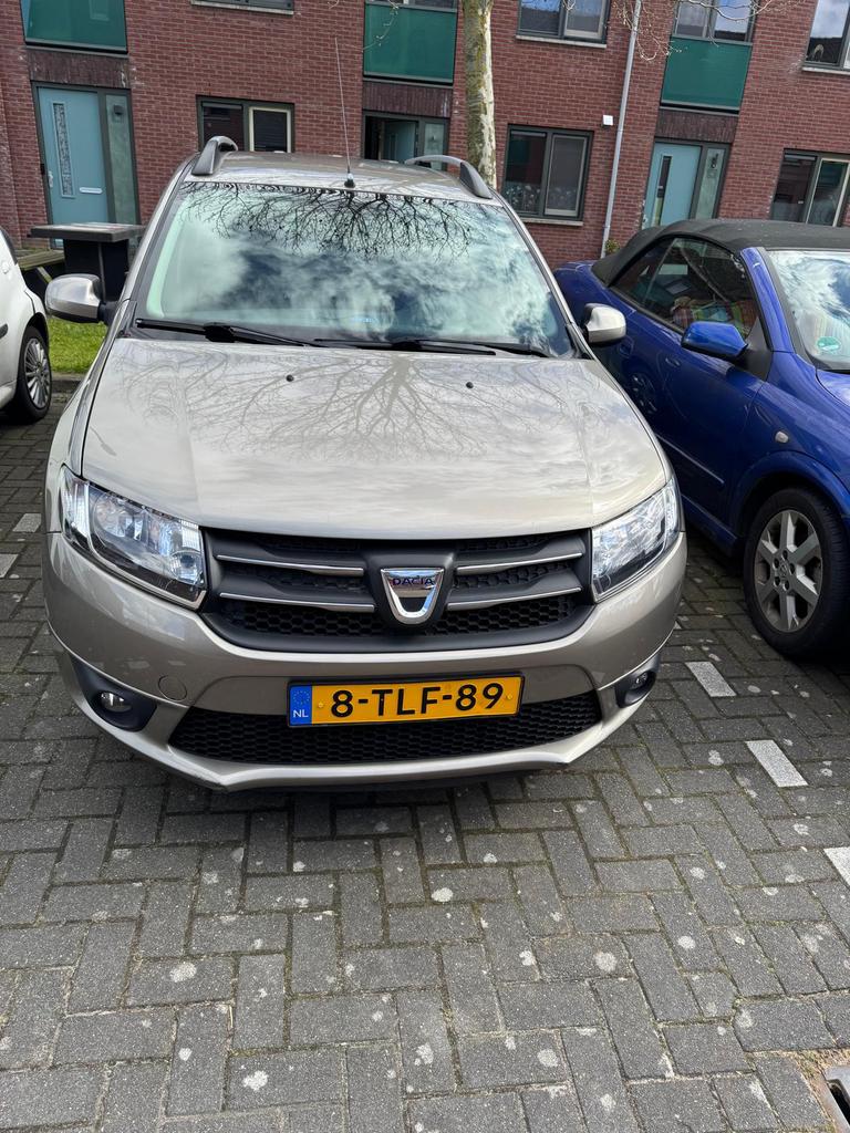 Dacia Logan 0.9 66KW TCE MCV 2014 Bruin, Auto's, Voorwielaandrijving, 898 cc, 40 €/maand, Bruin