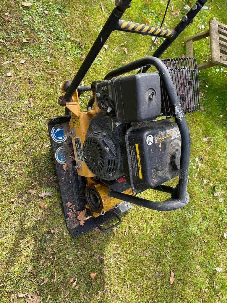 Trilplaat met defecte trilmotorlagers defect, Ophalen