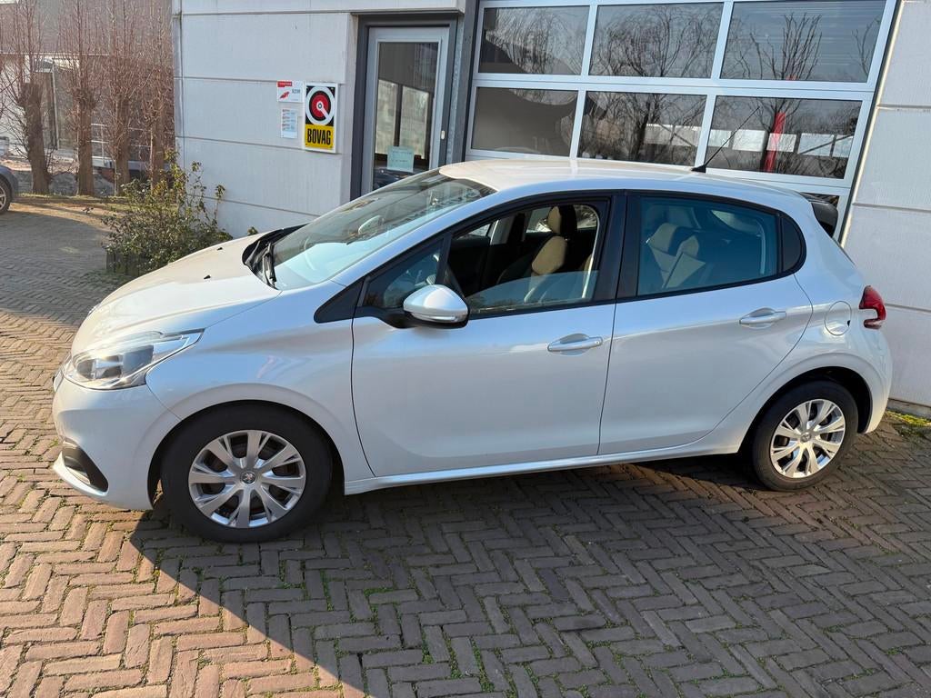 Peugeot 208 1.2 PureTech Blue Lion, Auto's, Voorwielaandrijving, Stof, Gebruikt, 1199 cc