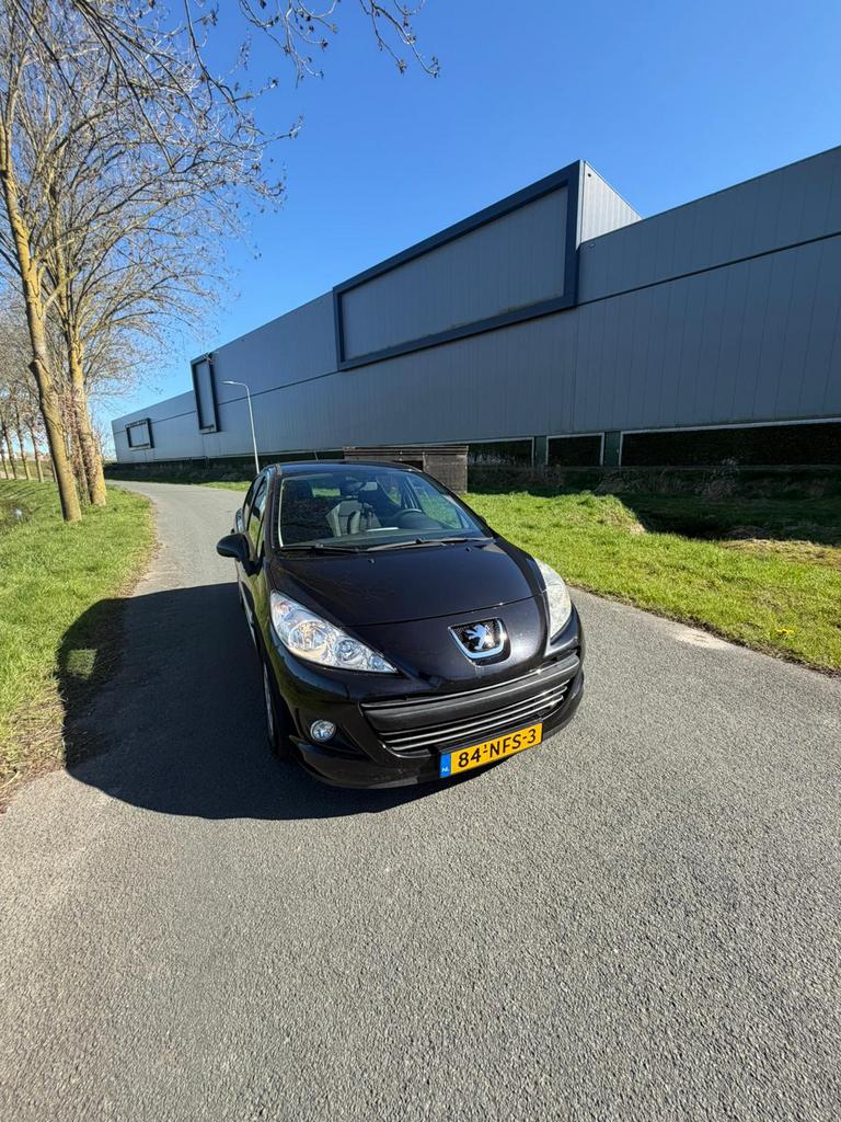 Peugeot 207 1.4 VTI 16V 5DRS 2010 Zwart, Auto's, Peugeot, Voorwielaandrijving, Zwart, Origineel Nederlands, Handgeschakeld