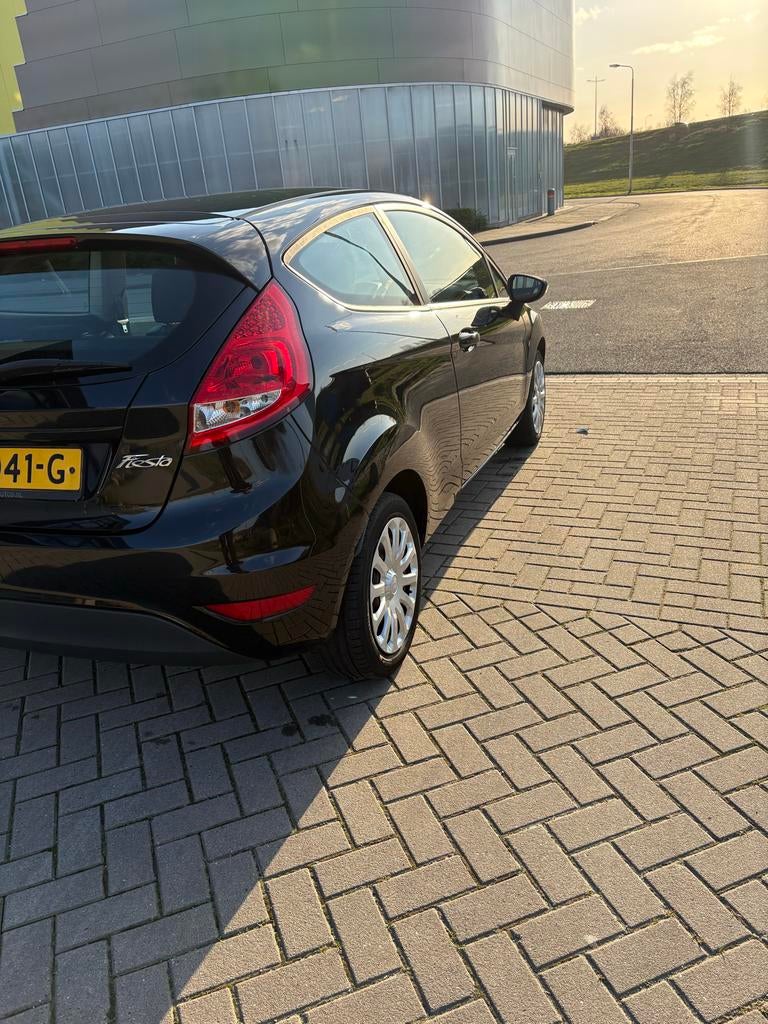 Ford Fiësta 1.25 44KW 3DR 2010 Zwart, Auto's, Voorwielaandrijving, 4 cilinders, Zwart, Handgeschakeld