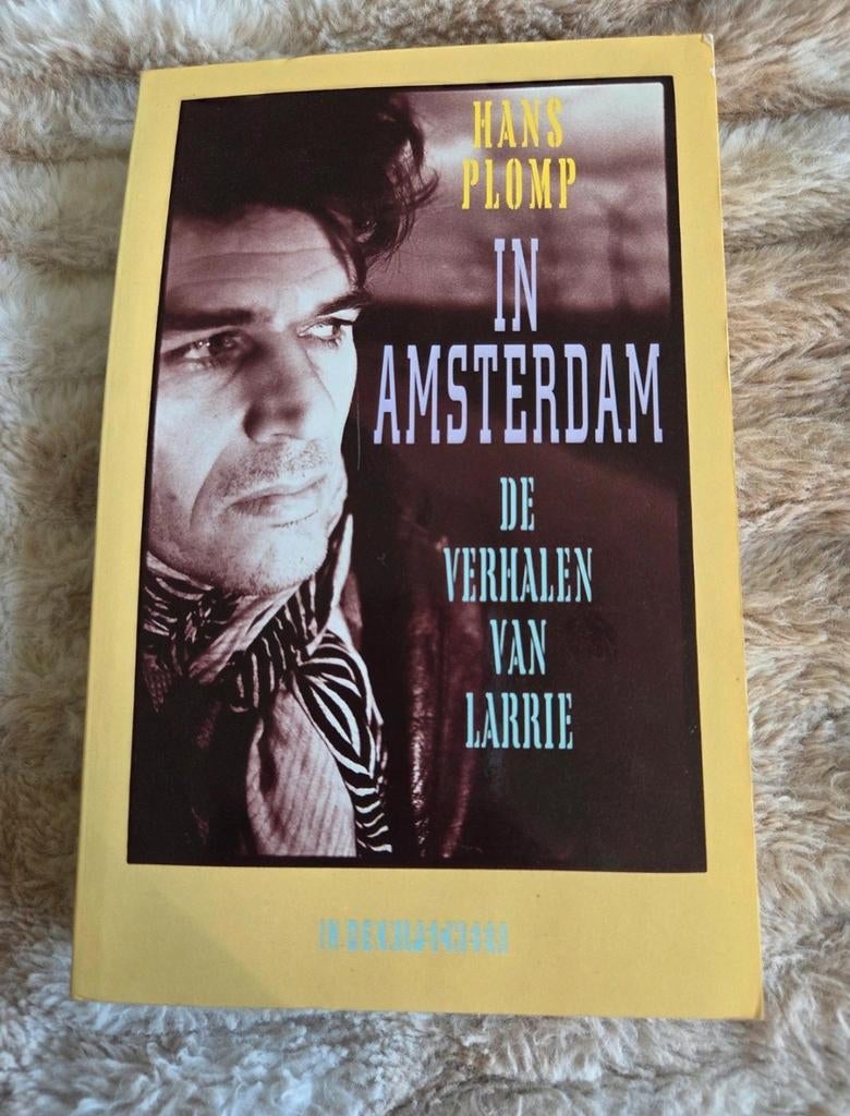 In Amsterdam - Hans Plomp, Ophalen of Verzenden, Zo goed als nieuw