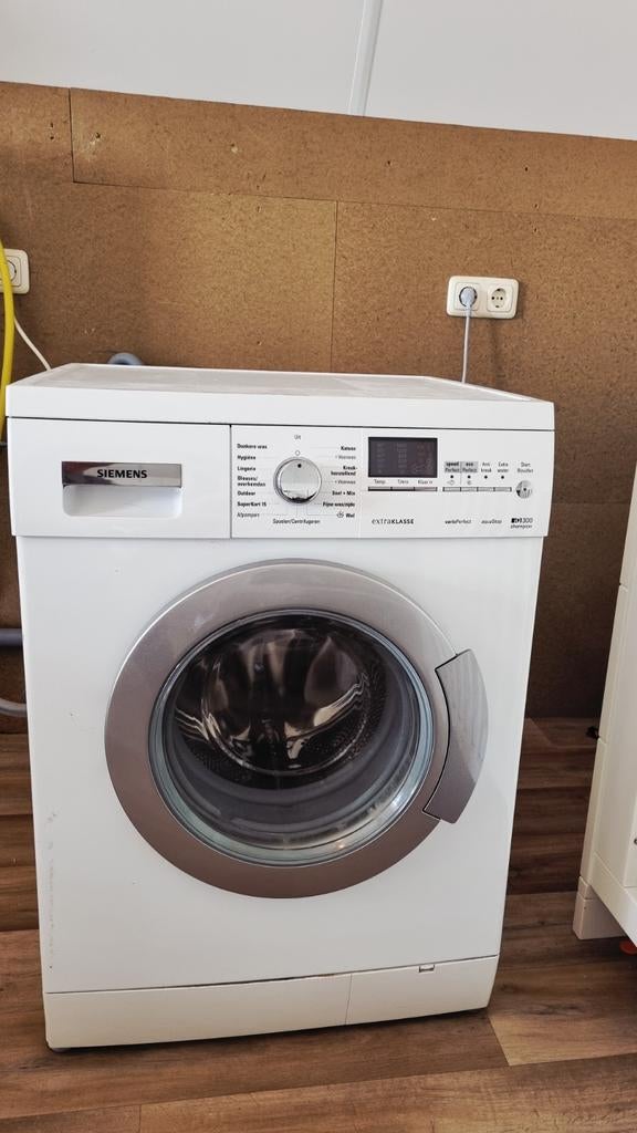Siemens IQ300 Champion Extraklasse Wasmachine (2014), 6 tot 8 kg, Ophalen, 1200 tot 1600 toeren, Minder dan 85 cm