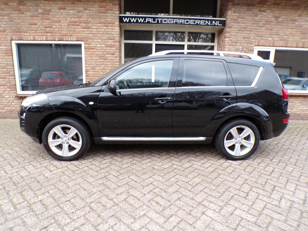 Peugeot 4007 2.4 GT 7p Automaat / Leder / Navi / 7 Persoons, Automaat, Euro 5, Gebruikt, Zwart