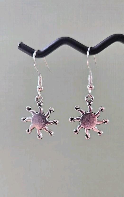 Zon oorbellen, Sieraden, Tassen en Uiterlijk, Piercings, Ophalen of Verzenden, Nieuw, Overige materialen