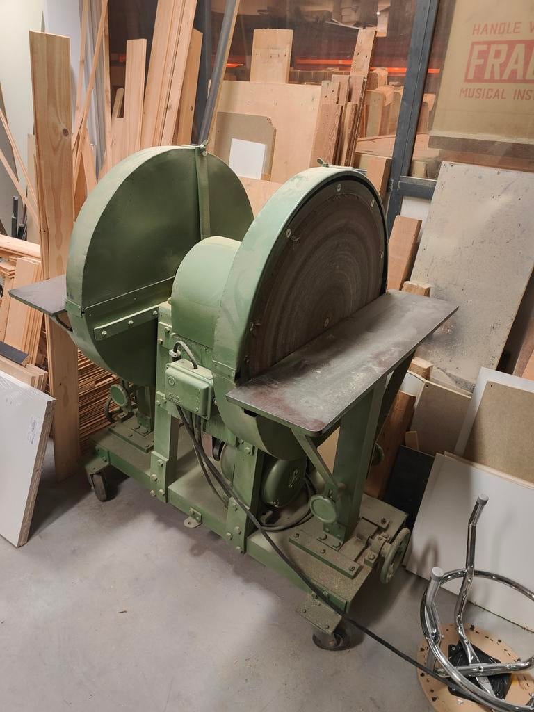 Dubbele schijf schuurmachine., Ophalen