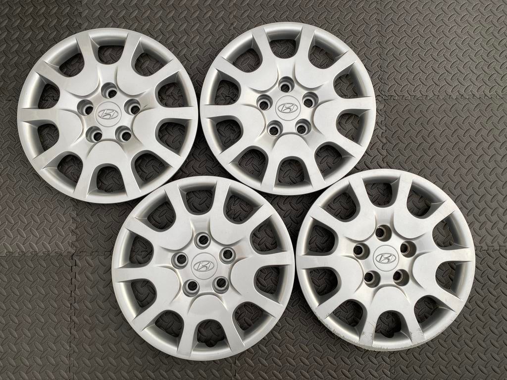 Set originele Hyundai I30 wieldoppen 15 inch, Ophalen of Verzenden, Gebruikt