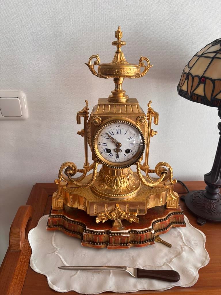 Antieke franse pendule, Ophalen