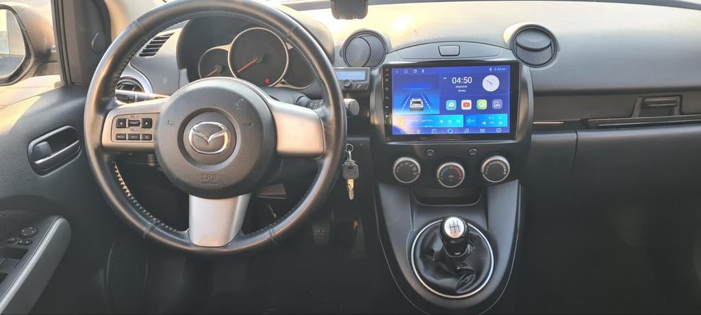 Mazda 2 1.3 63KW 5DRS 2009 Zwart, Voorwielaandrijving, 31 €/maand, 4 cilinders, Zwart