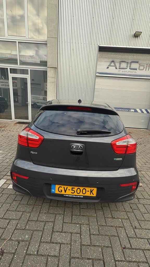 Kia Rio 1.2 I 5DRS 2015 Grijs, Auto's, 1027 kg, 450 kg, 40 €/maand, 4 cilinders
