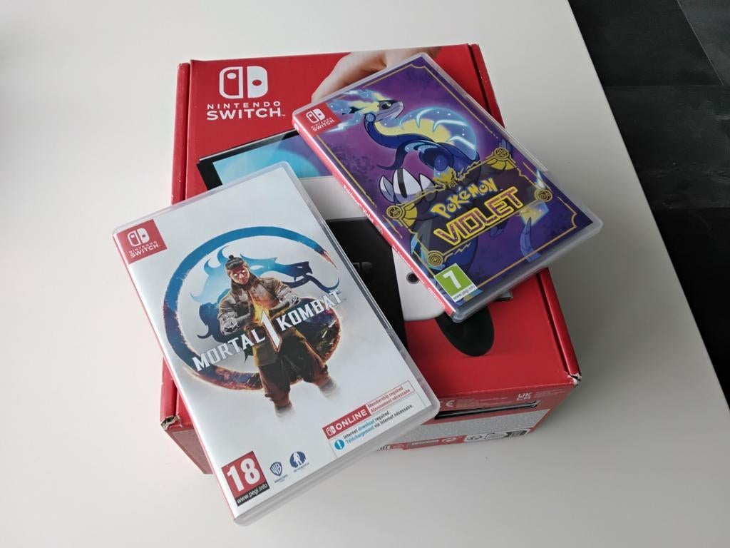 Nintendo Switch OLED met Mortal Kombat en Pokémon Violet, Spelcomputers en Games, Vanaf 18 jaar, Overige genres, 1 speler, Ophalen of Verzenden