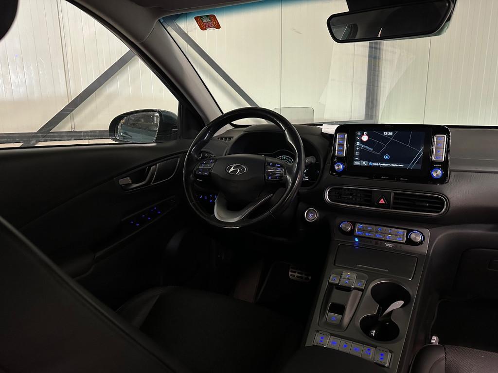 Hyundai Kona EV Premium 64kWh | SOH 100% | Leer | Navi | Tre, Gebruikt, Blauw, Regensensor, 630 min