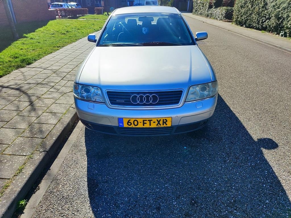 Audi A6 2.4 Quattro 121KW AUT 2000 Grijs, Auto's, Automaat, 164 pk, Origineel Nederlands, Vierwielaandrijving