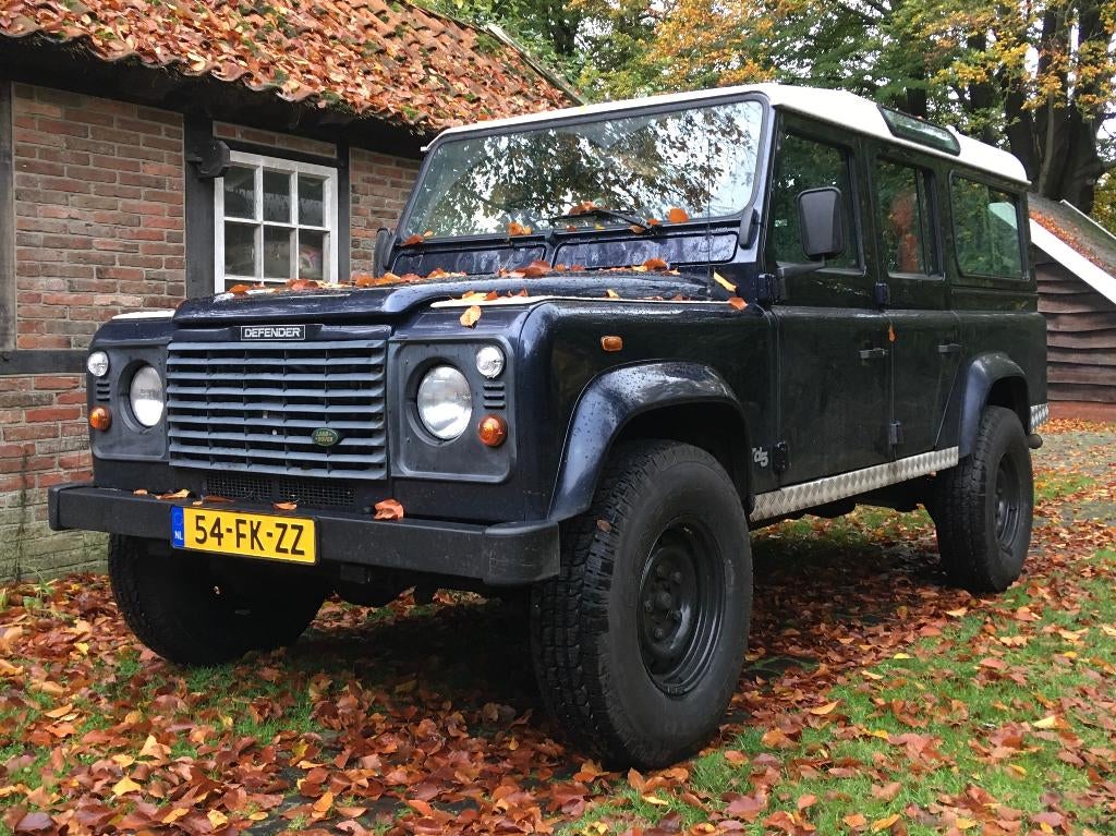 Land Rover Defender 9-pers. youngtimer 2.5TD5 STWGN 110 2000, Auto's, Land Rover, Euro 2, 3500 kg, Blauw, Leder en Stof