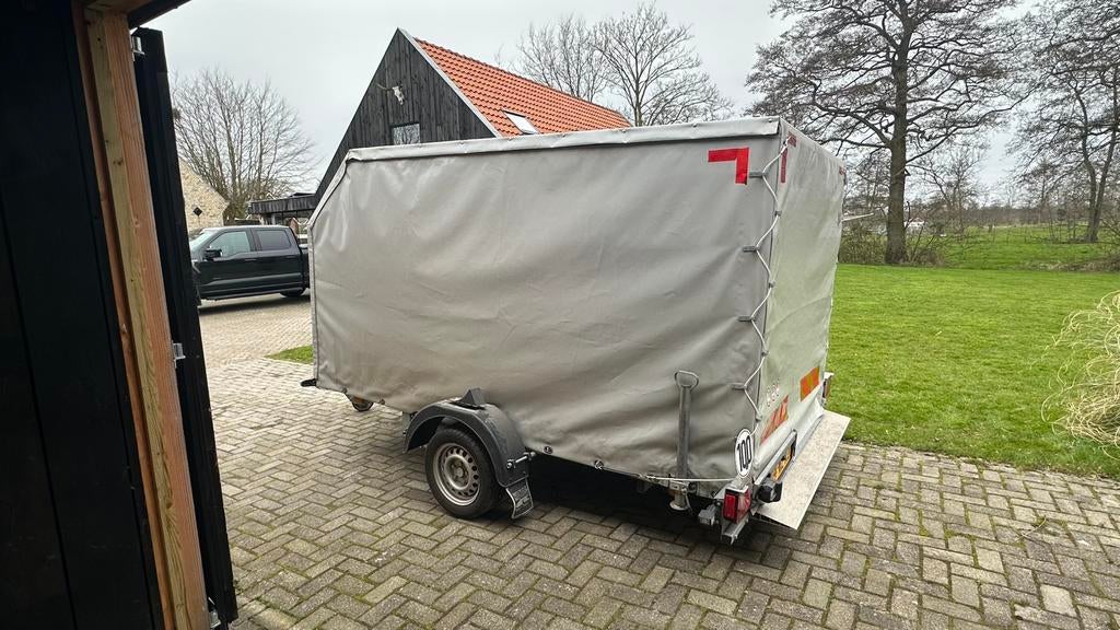 Multifunctionele afzinkbare aanhangwagen, Ophalen, Zo goed als nieuw