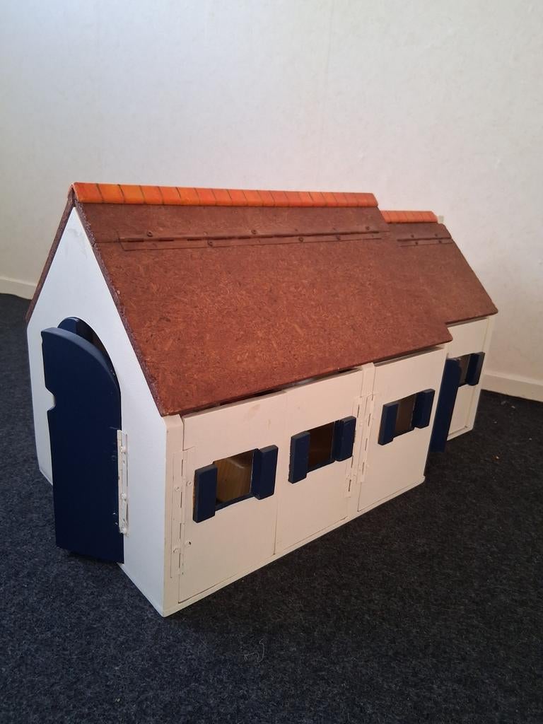 Houten speelboerderij, Ophalen