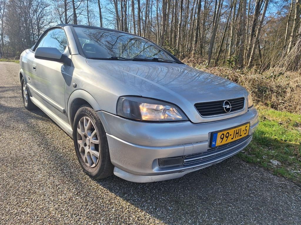 Opel astra G cabrio Benzine duur? LPG g3, Auto's, Voorwielaandrijving, 1282 kg, Zwart, 4 cilinders