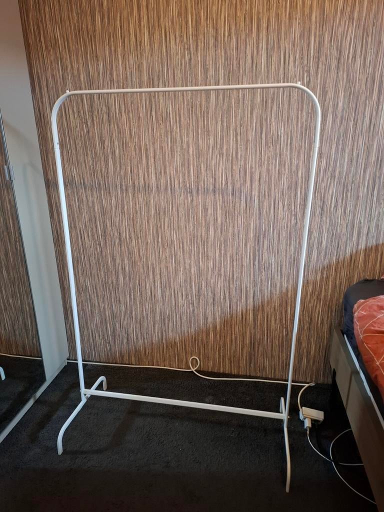 Kledingrek wit, Ophalen