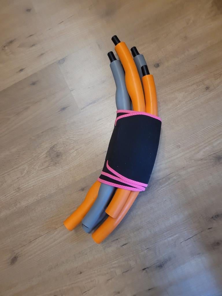 Sporthoepel met buikband, Ophalen