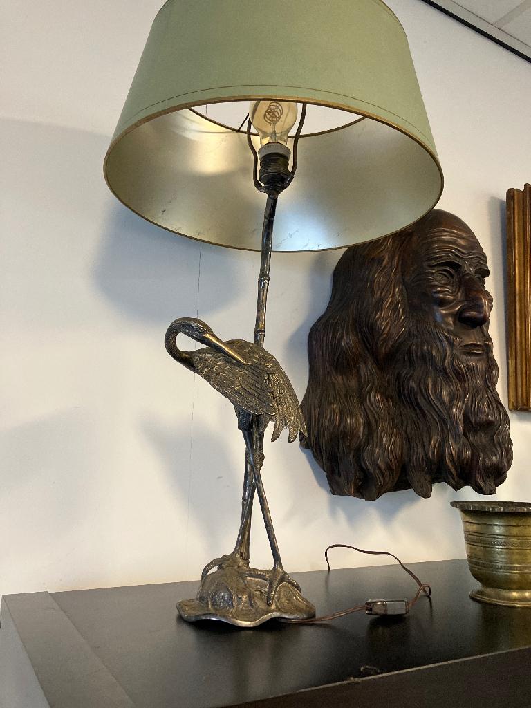 Bronzen lamp, Ophalen, Brons