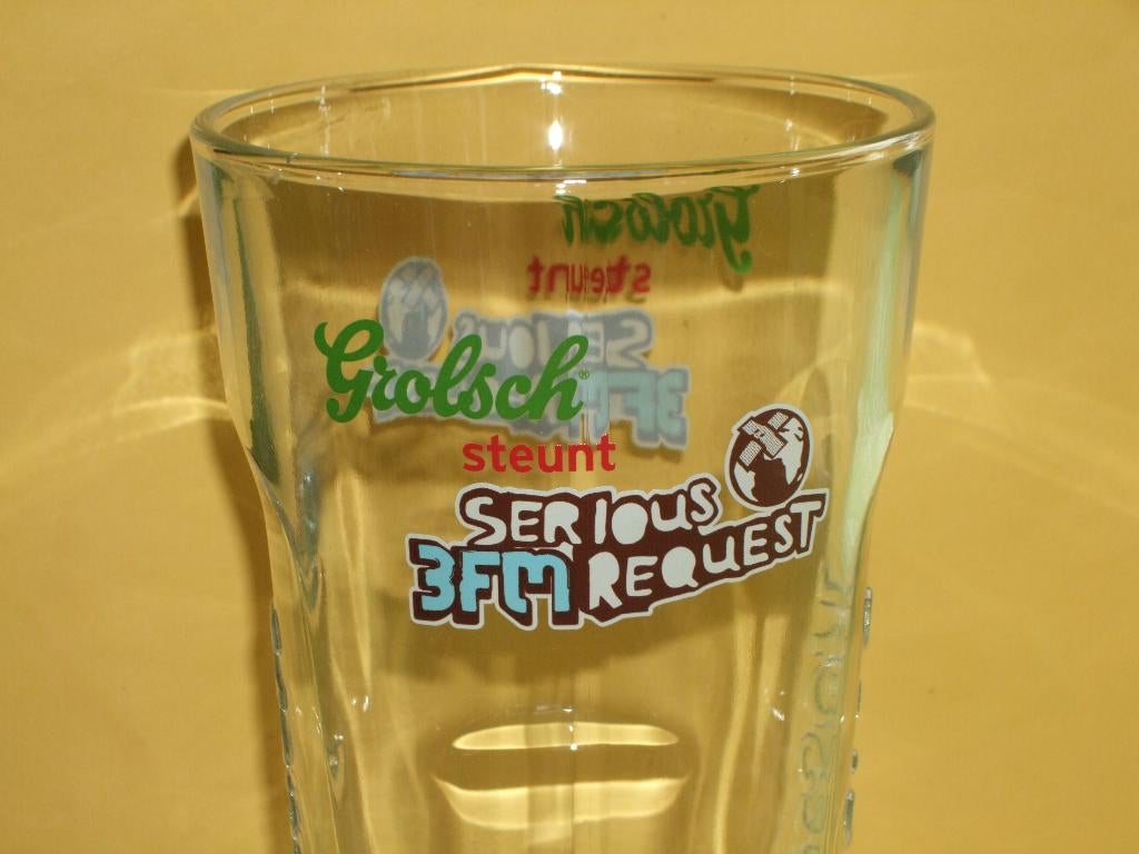 Grolsch steunt 3FM serious request glas, Ophalen of Verzenden, Zo goed als nieuw, Glas of Glazen, Grolsch