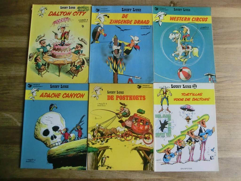 6 stripboeken uit de reeks van Lucky Luke, Meerdere stripboeken, Ophalen of Verzenden, Gelezen