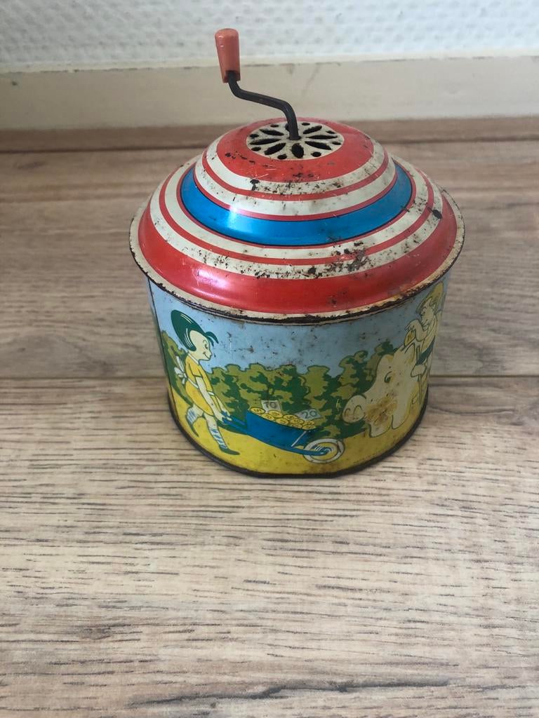 Oude blikken tol met kindertekeningen, Ophalen of Verzenden