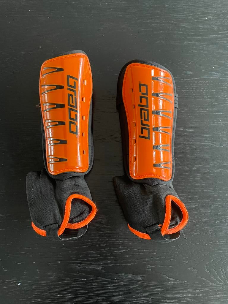Scheenbeschermers Brabo oranje nieuw, Sport en Fitness, Hockey, Ophalen, Nieuw, Overige typen