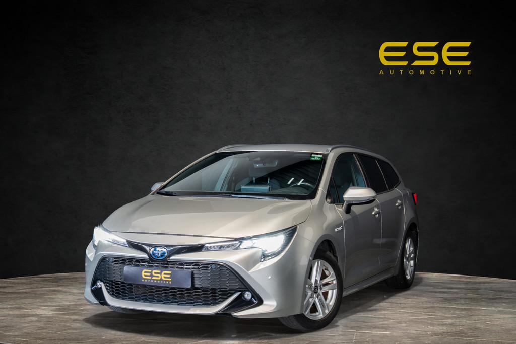 Toyota Corolla 1.8 Hybrid Business Plus | Navigatie | Camera, Stof, Gebruikt, Euro 6, Corolla