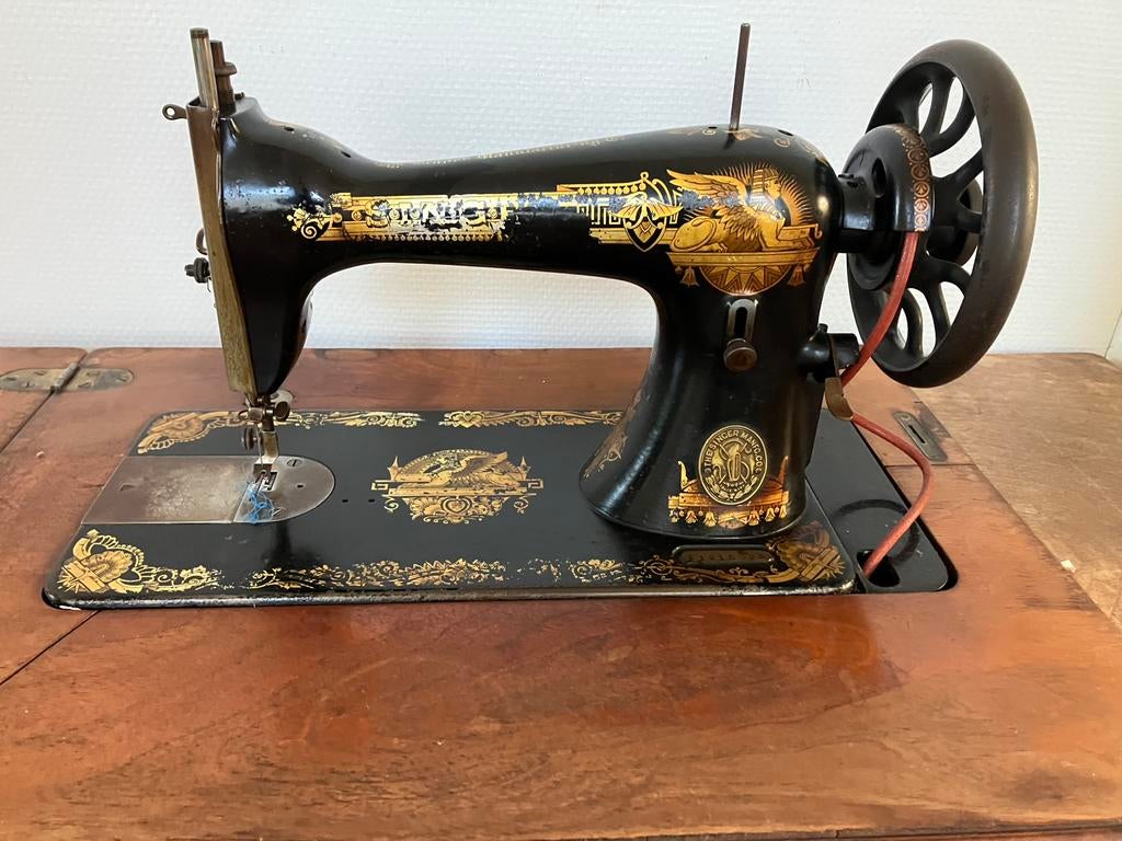 Naaimachine   trap, Ophalen