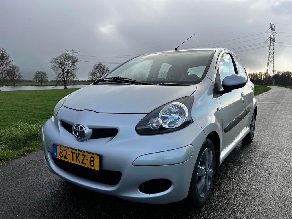 Toyota Aygo 1.0 12V Navigator - Airco - navi - Nieuwe APK, Auto's, Toyota, Bedrijf, Te koop, Aygo, ABS, Airbags, Airconditioning